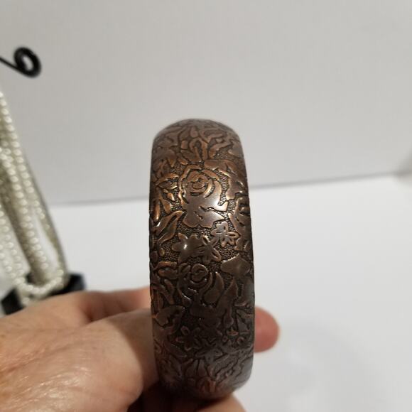 Two bracelets one copper colored bangle one multi chain faux - Picture 2 of 13